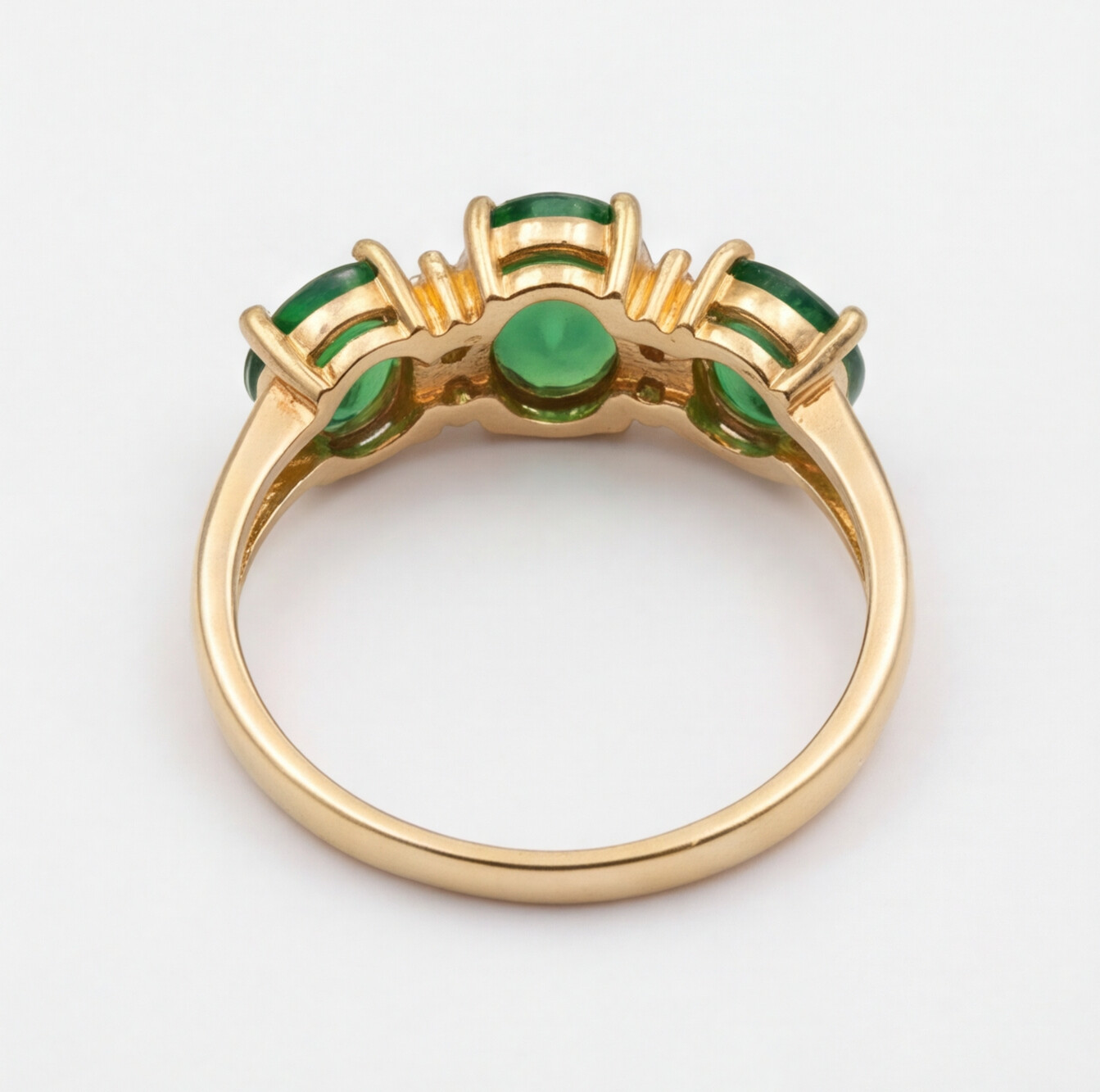 Anel em ouro 18k com esmeraldas e diamantes